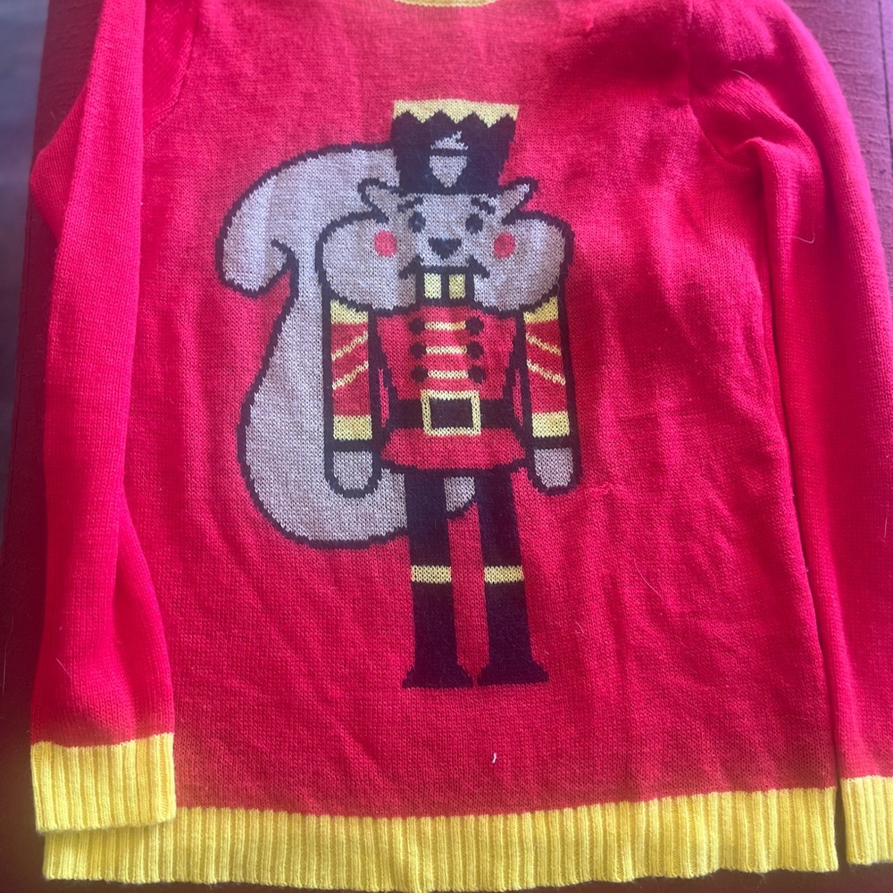 Red Nutcracker Sweater with Yellow Trim